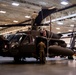 National Guard Helicopter Crew Chiefs conduct Maintenance on Black Hawk Helicopters