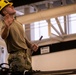 National Guard Helicopter Crew Chiefs conduct Maintenance on Black Hawk Helicopters