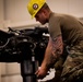 National Guard Helicopter Crew Chiefs conduct Maintenance on Black Hawk Helicopters