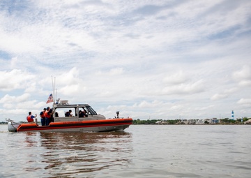 Coast Guard boat crew patrols near Kemah, Texas