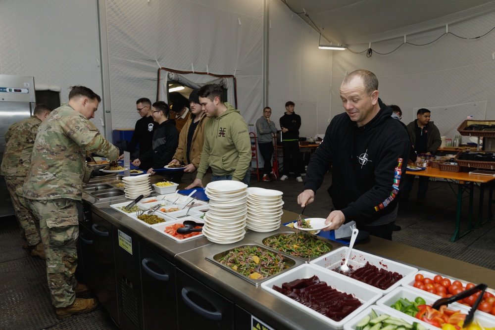 3rd Infantry Division Artillery Soldiers enjoy a Christmas meal in Latvia