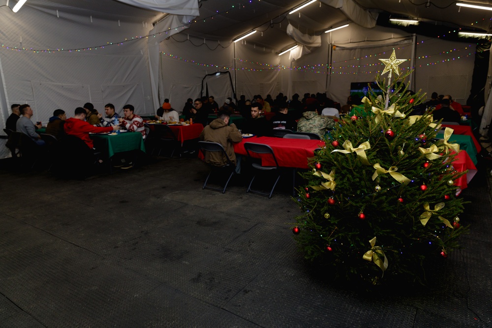 3rd Infantry Division Artillery Soldiers enjoy a Christmas meal in Latvia