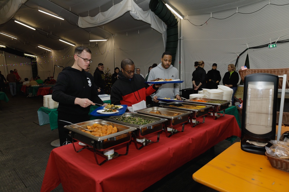 3rd Infantry Division Artillery Soldiers enjoy a Christmas meal in Latvia