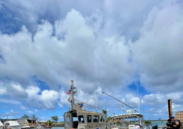 U.S. Coast Guard aids stranded vessel Rascal off Tanguisson Beach, Guam, on Christmas weekend