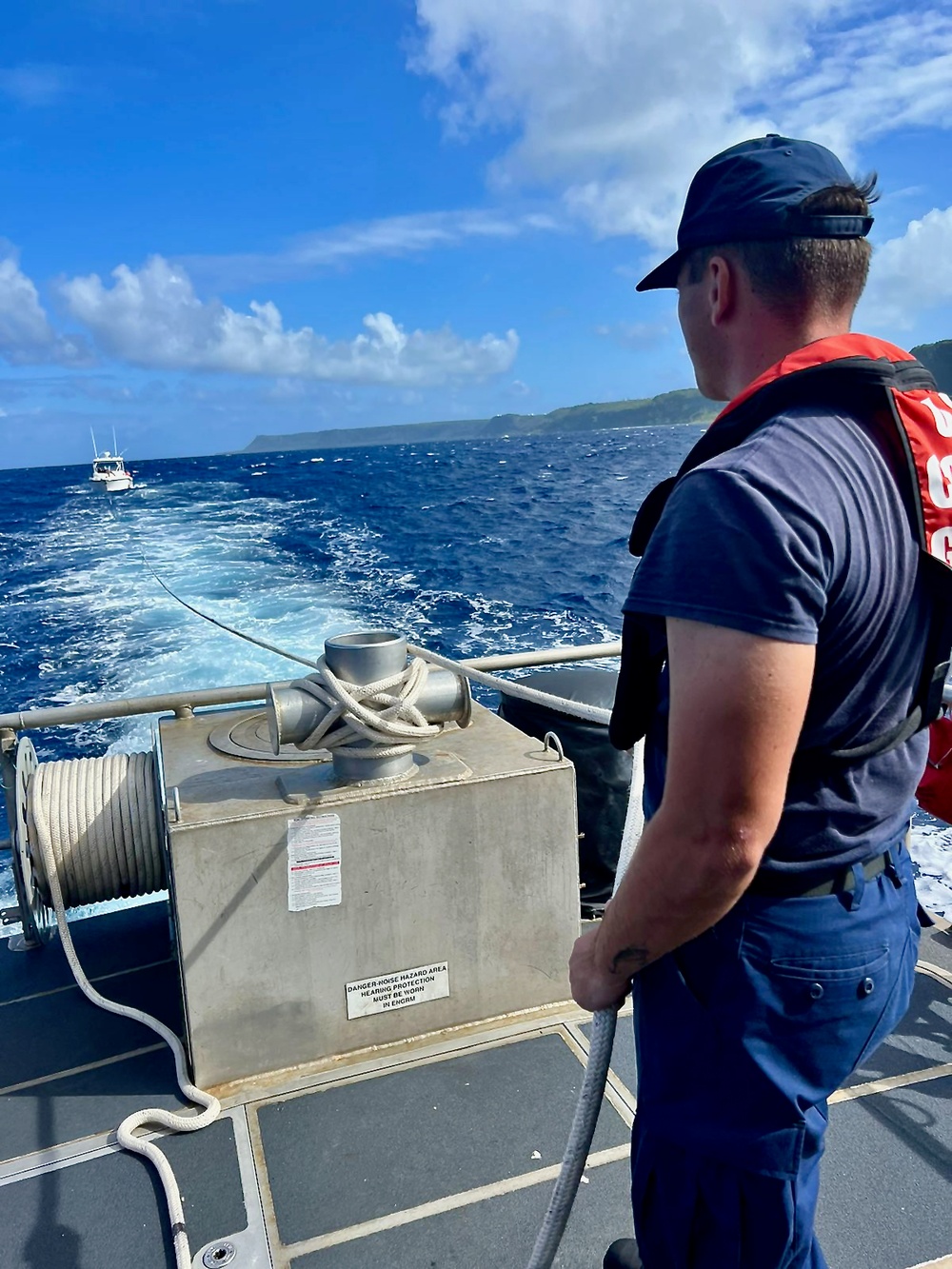 U.S. Coast Guard aids stranded vessel Rascal off Tanguisson Beach, Guam, on Christmas weekend