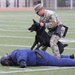 Military working dogs sniff out narcotics, display skills for anti-drug week