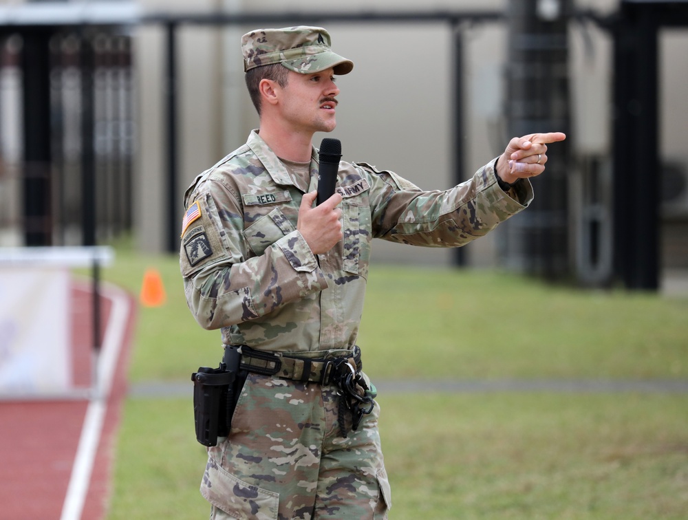 Military working dogs sniff out narcotics, display skills for anti-drug week