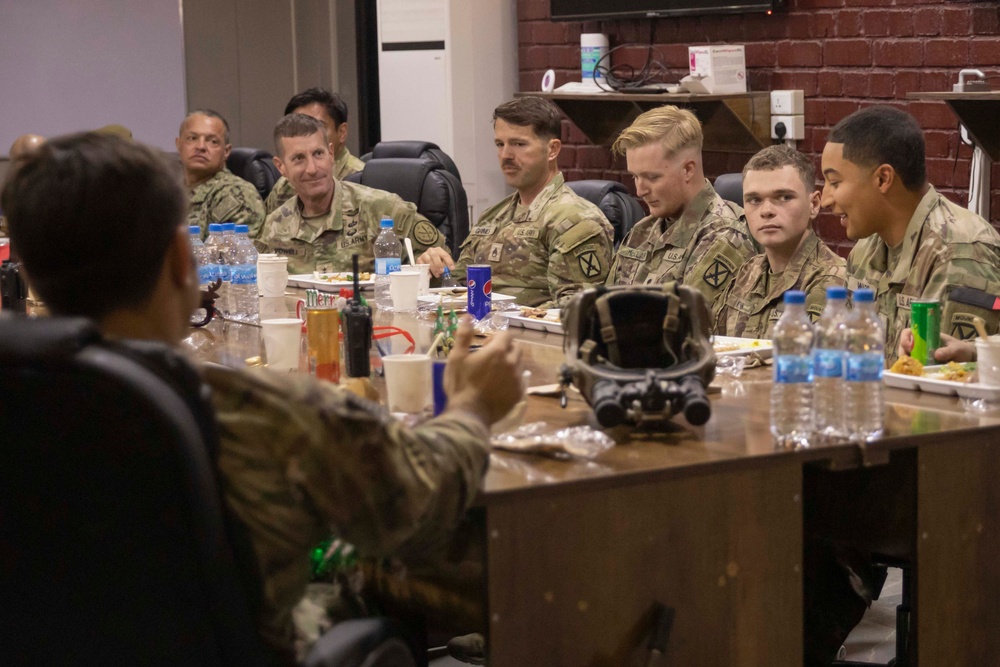 Commander shares Christmas dinner with frontline troops