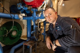 USS BATAAN TURNS SALT WATER TO FRESHW WATER