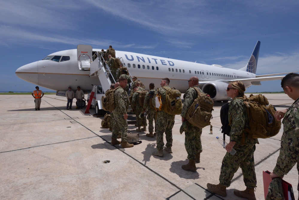 U.S. Coast Guard Port Security Unit 305 decommissions unit and Coast Guard mission in Guantanamo Bay, Cuba after 21 years