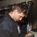 USS Ronald Reagan (CVN 76) Sailors conduct machine repairs and installations