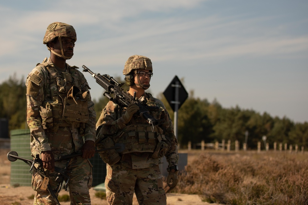 Base of the Pyramid Soldiers conduct crew-served weapon qualification in Poland