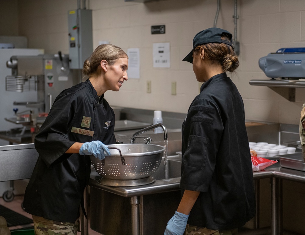 180FW Prepares Holiday Meal