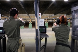 445th AW, 655th ISRW train on new strike-fire pistol