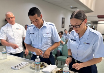 Celebrity Chef Robert Irvine inspires Airmen with healthy dinner and cooking demo