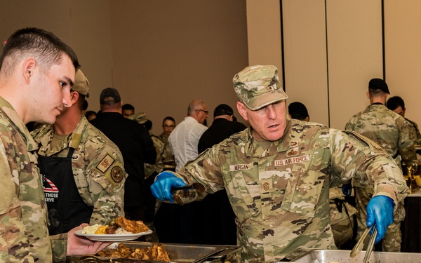 Chief serves up dinner along side Chef
