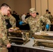 Chief serves up dinner along side Chef