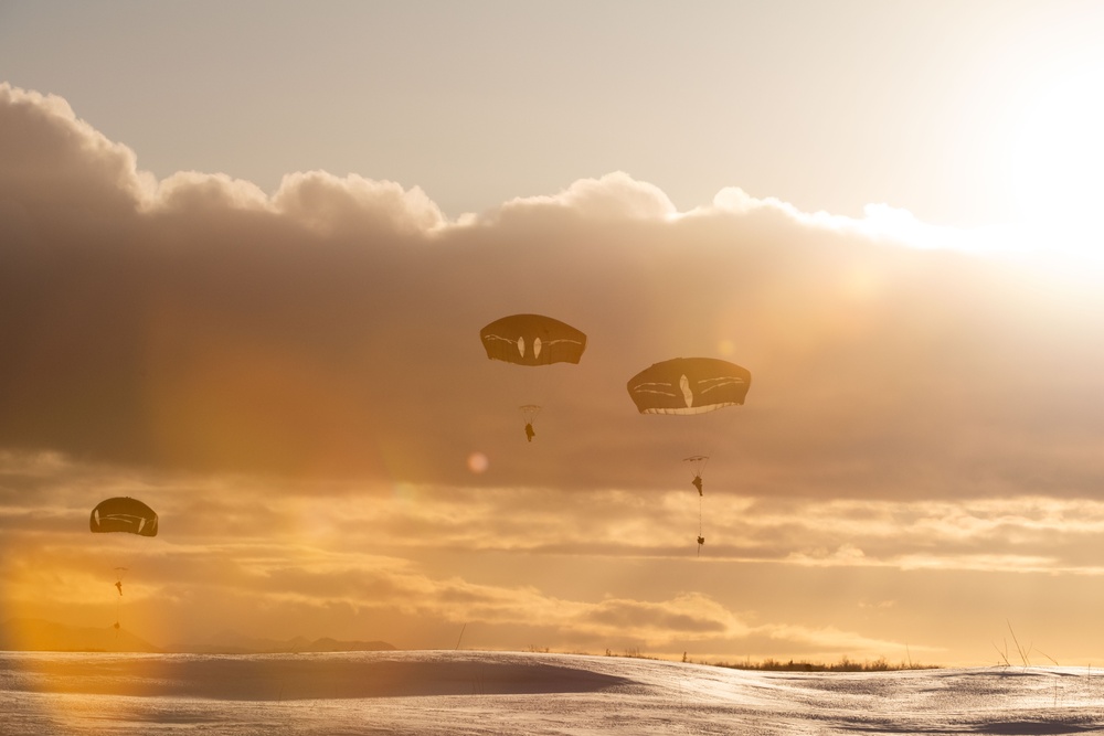 Army paratroopers and Marine Corps aviators conduct joint airborne training at JBER