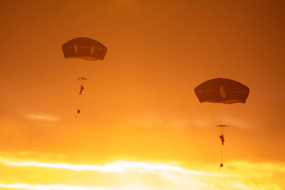 Army paratroopers and Marine Corps aviators conduct joint airborne training at JBER