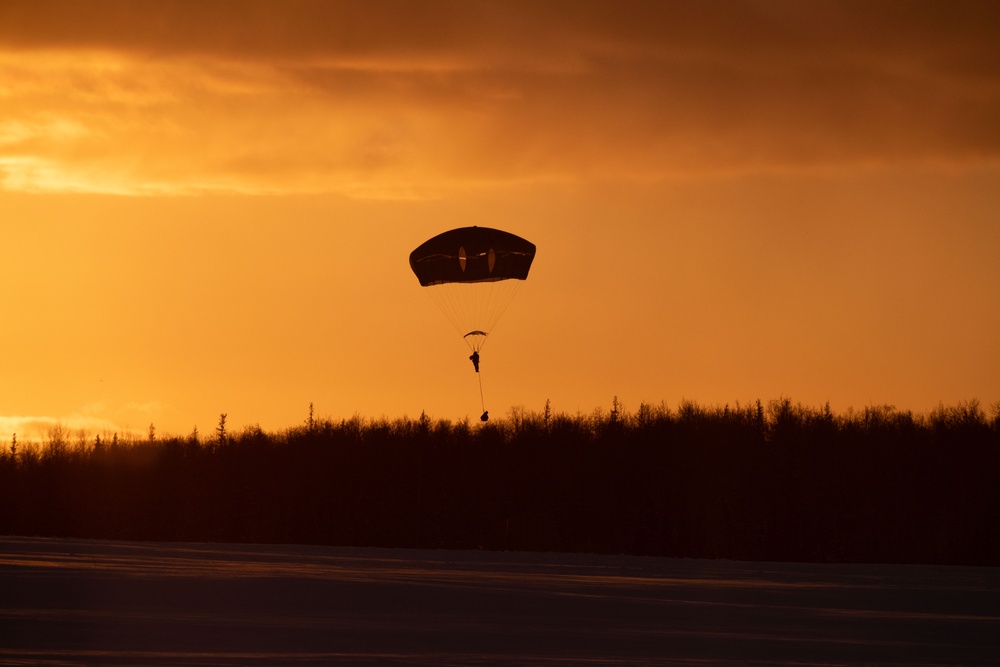 Army paratroopers and Marine Corps aviators conduct joint airborne training at JBER