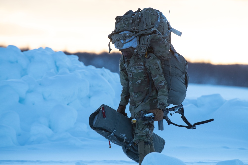 Army paratroopers and Marine Corps aviators conduct joint airborne training at JBER