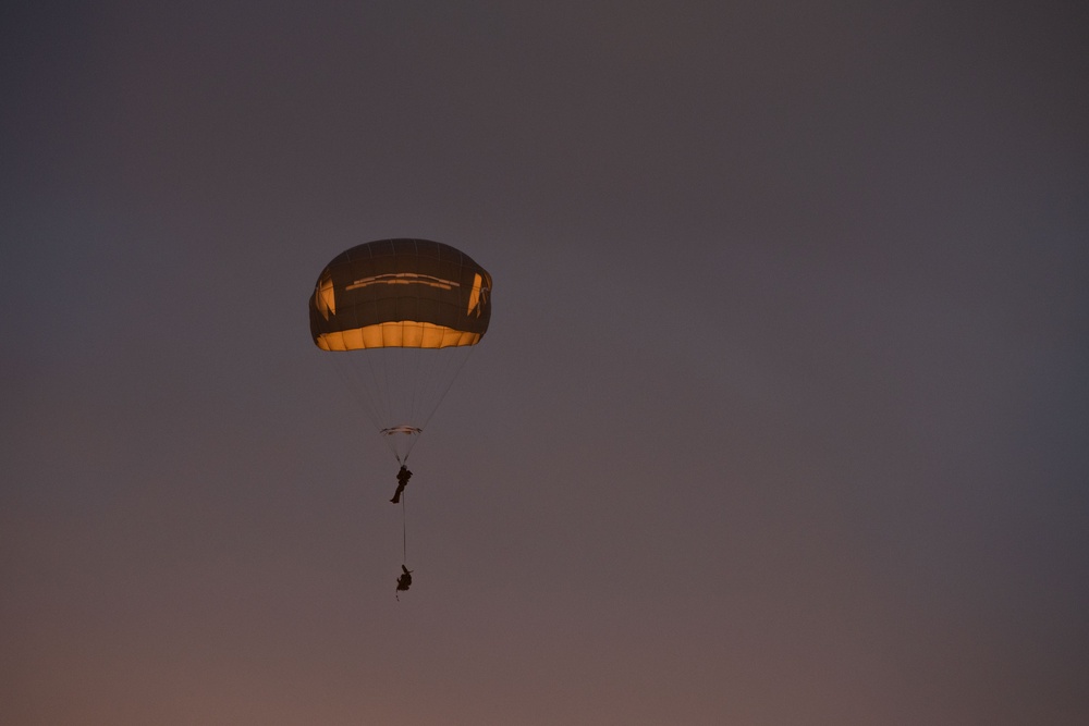 Army paratroopers and Marine Corps aviators conduct joint airborne training at JBER