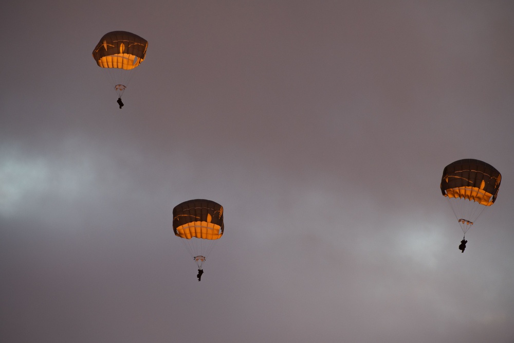 Army paratroopers and Marine Corps aviators conduct joint airborne training at JBER