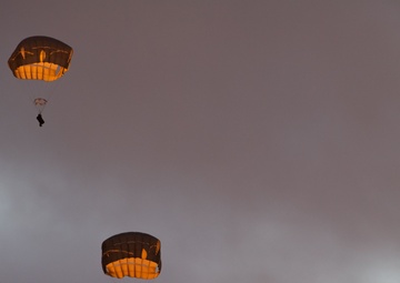 Army paratroopers and Marine Corps aviators conduct joint airborne training at JBER
