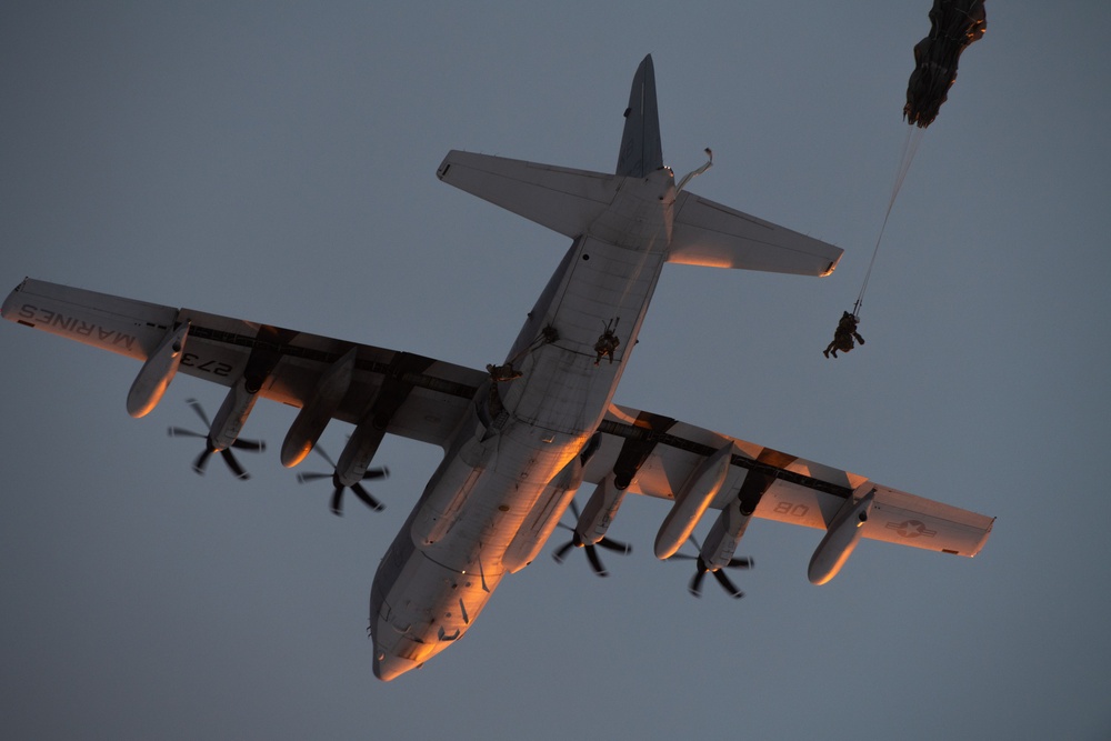 Army paratroopers and Marine Corps aviators conduct joint airborne training at JBER