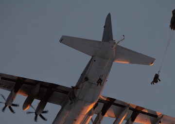 Army paratroopers and Marine Corps aviators conduct joint airborne training at JBER