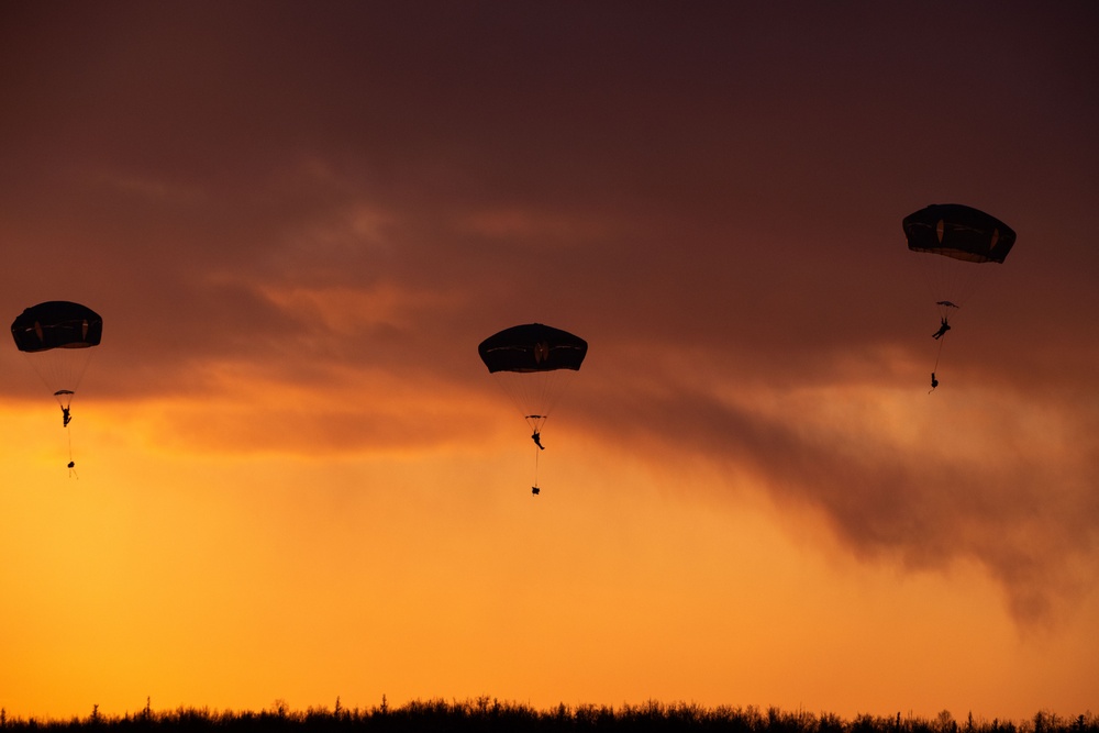 Army paratroopers and Marine Corps aviators conduct joint airborne training at JBER