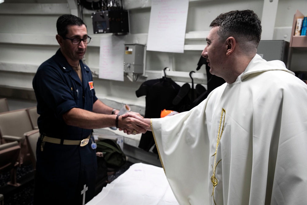 Vinson Chaplain Holds Catholic Mass Aboard Sterett
