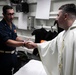 Vinson Chaplain Holds Catholic Mass Aboard Sterett