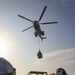 USS Carter Hall (LSD 50) Conducts Vertical Replenishment, Dec. 6, 2023