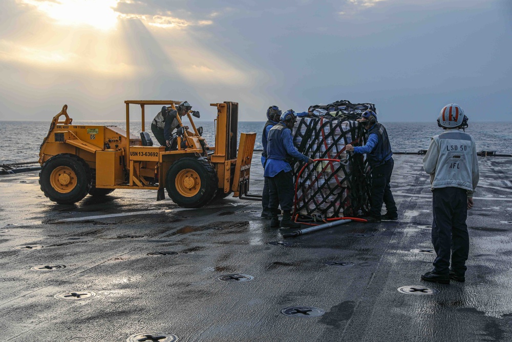 USS Carter Hall (LSD 50) Conducts Vertical Replenishment, Dec. 6, 2023