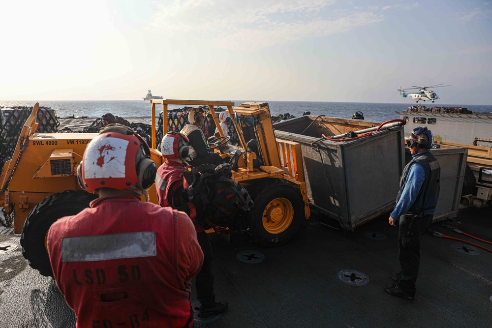 USS Carter Hall (LSD 50) Conducts Vertical Replenishment, Dec. 6, 2023