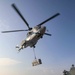 USS Carter Hall (LSD 50) Conducts Vertical Replenishment, Dec. 6, 2023