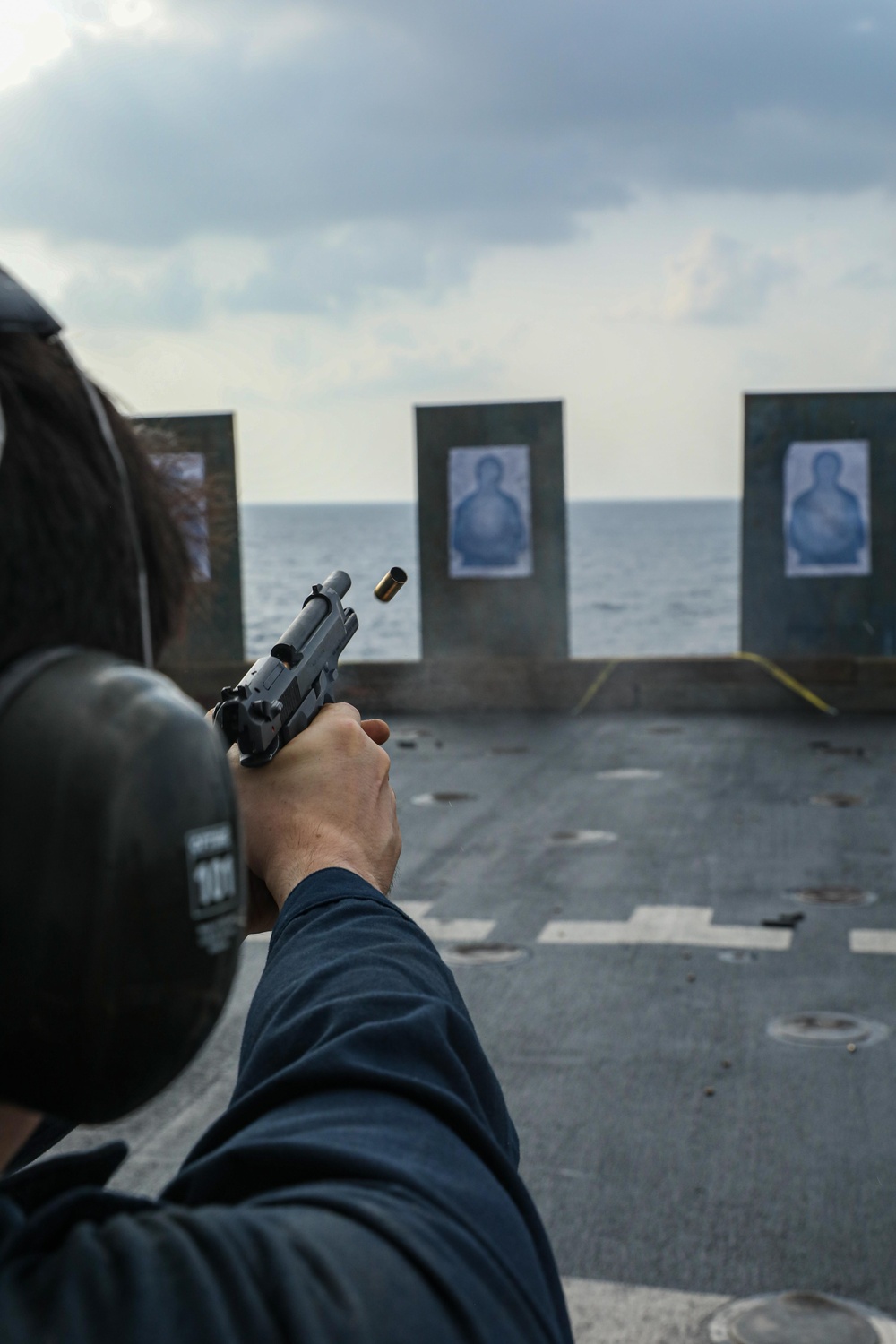 USS Carter Hall Sailors Conduct a Small Arms Qualification Shoot