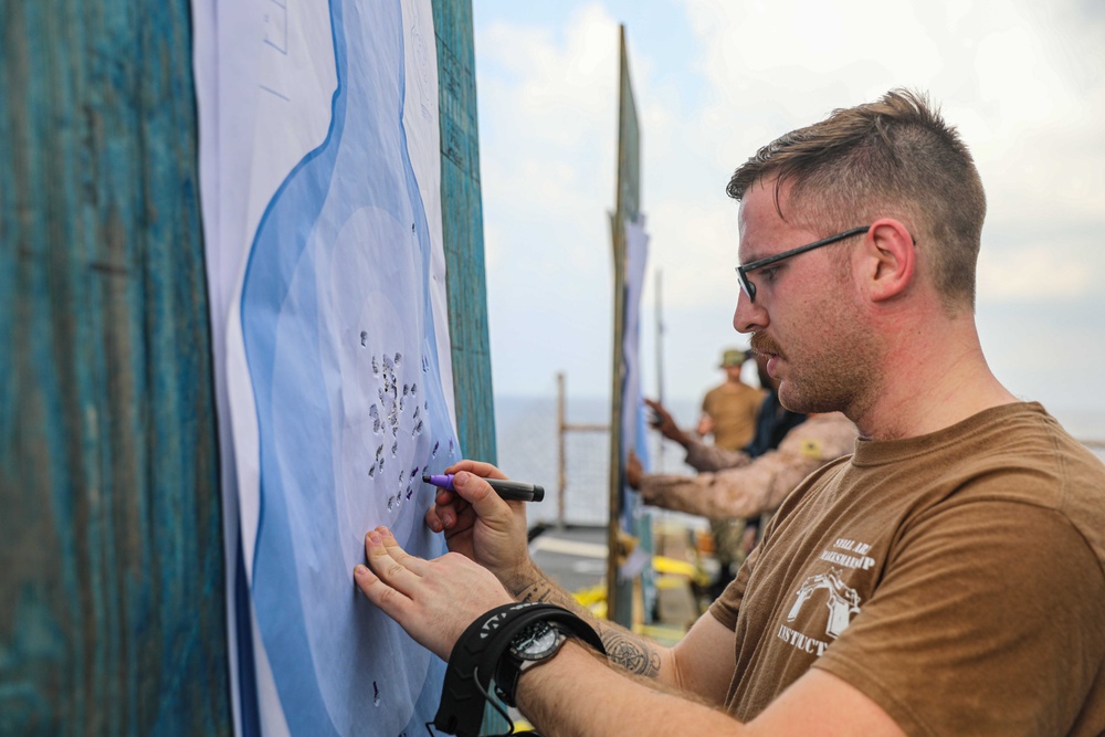 USS Carter Hall Sailors Conduct a Small Arms Qualification Shoot