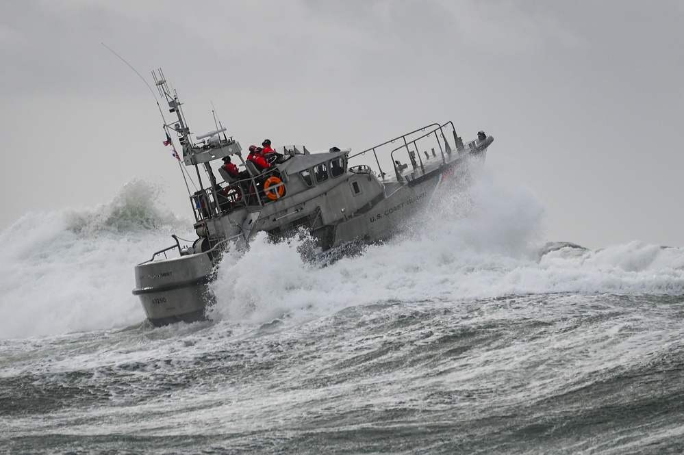 Coast Guard Station Cape Disappointment trains in surf conditions