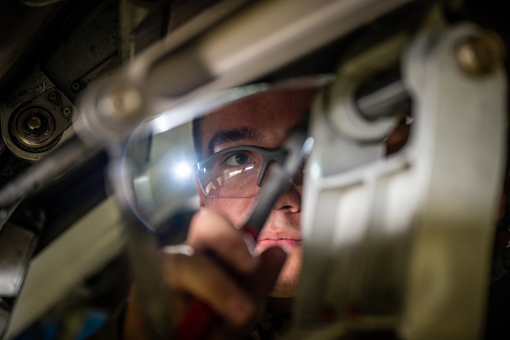 932nd AW crew chiefs perform routine inspection on C-40C