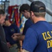 Representative Ed Case Views Octocoral with Pearl Harbor Naval Shipyard Divers