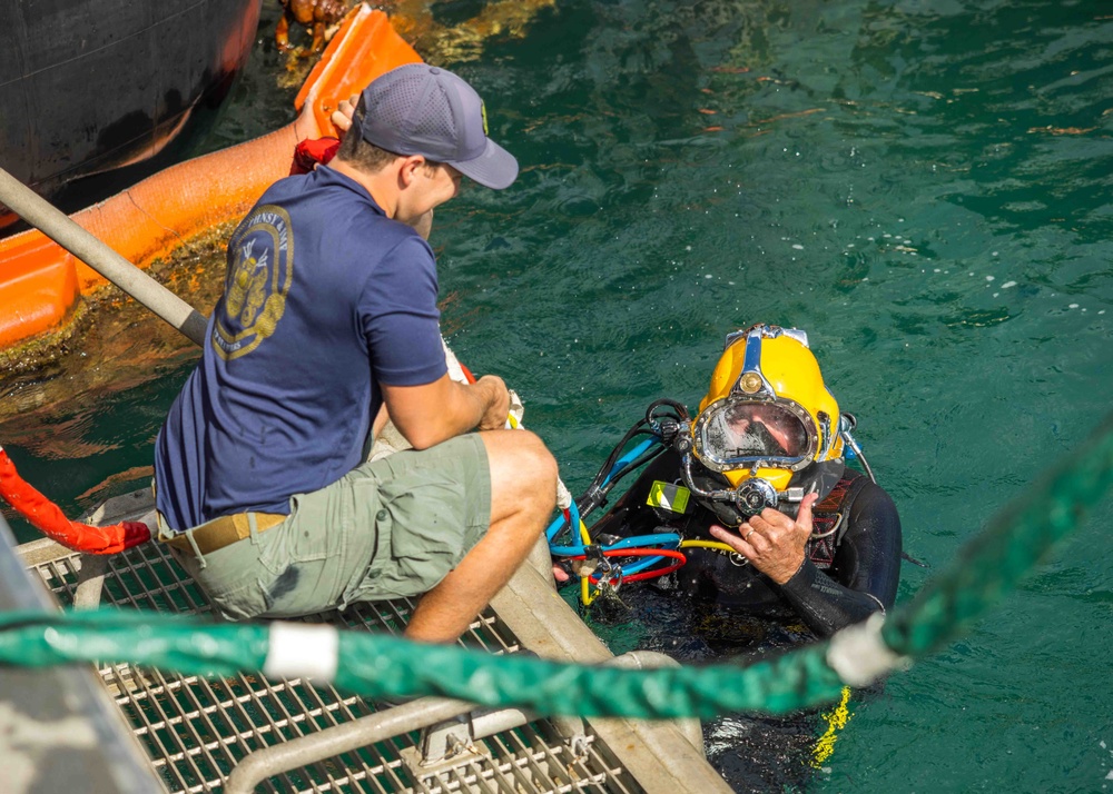 Representative Ed Case Views Octocoral with Pearl Harbor Naval Shipyard Divers