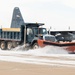 139th members remove snow from flightline, aircraft