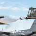 139th members remove snow from flightline, aircraft