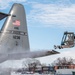 139th members remove snow from flightline, aircraft