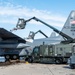 139th members remove snow from flightline, aircraft