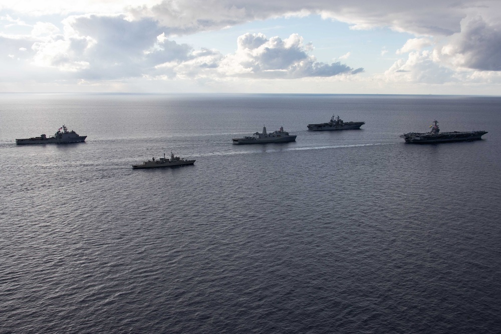 PHOTOEX USS Gerald R. Ford Carrier Strike Group Sails in Formation with USS Bataan Amphibious Ready Group in the Mediterranean Sea