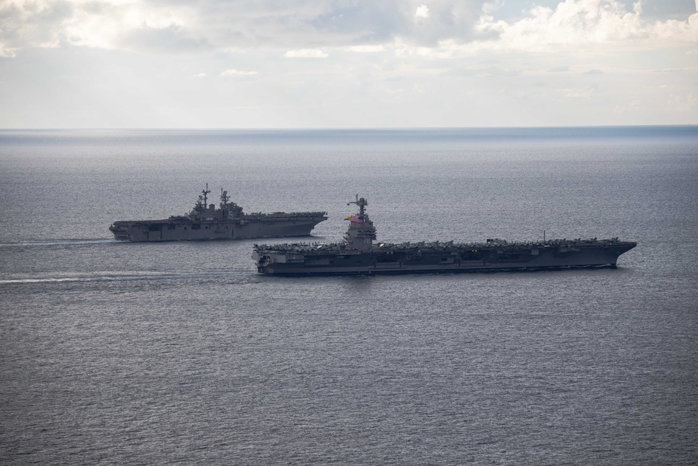 PHOTOEX USS Gerald R. Ford Carrier Strike Group Sails in Formation with USS Bataan Amphibious Ready Group in the Mediterranean Sea