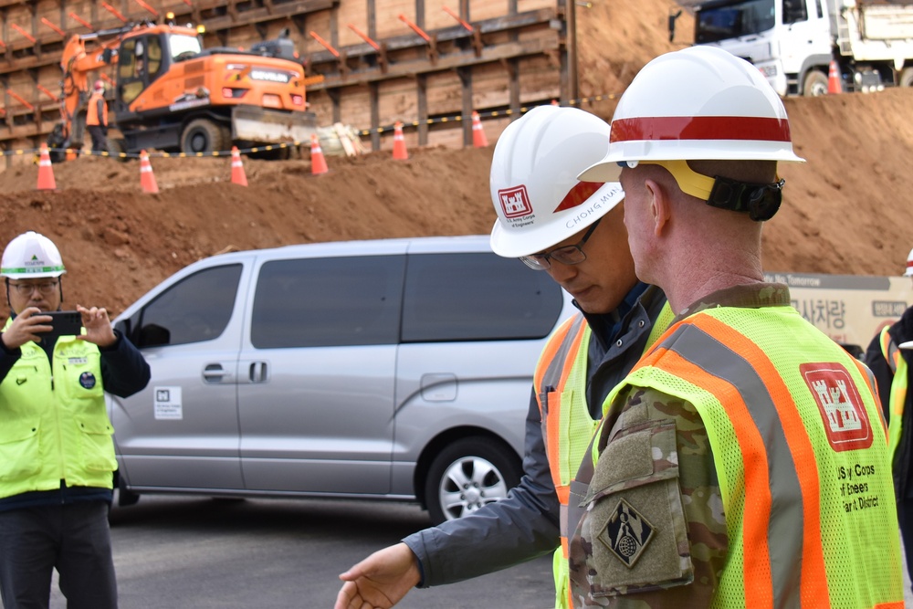 USACE Pacific Ocean Division general tours communications center under construction on Osan Air Base, South Korea